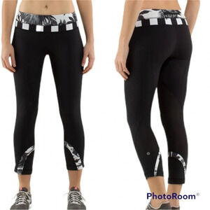 Lululemon 4 black crop II leggings Brisk Bloom, waistband w/zip & size. Pull tag